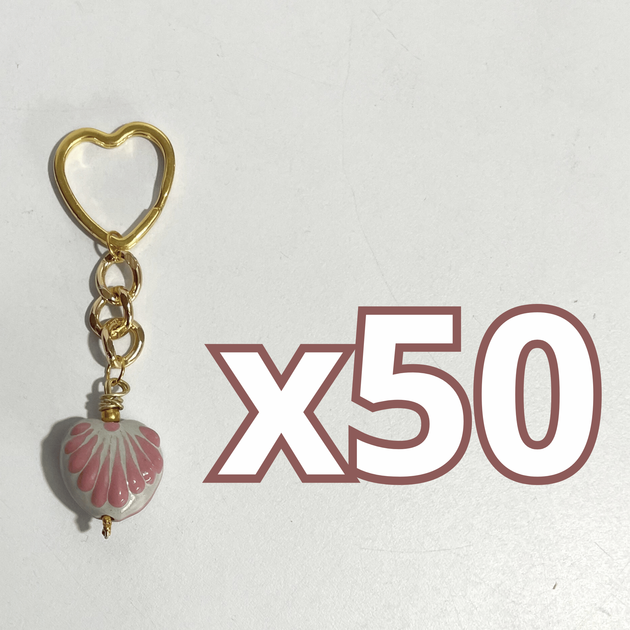 LLAVERO CORAZON CHICO 2.5 CM TRIDIMENSIONAL FONDO TRADICIONAL DECORADO ROSA