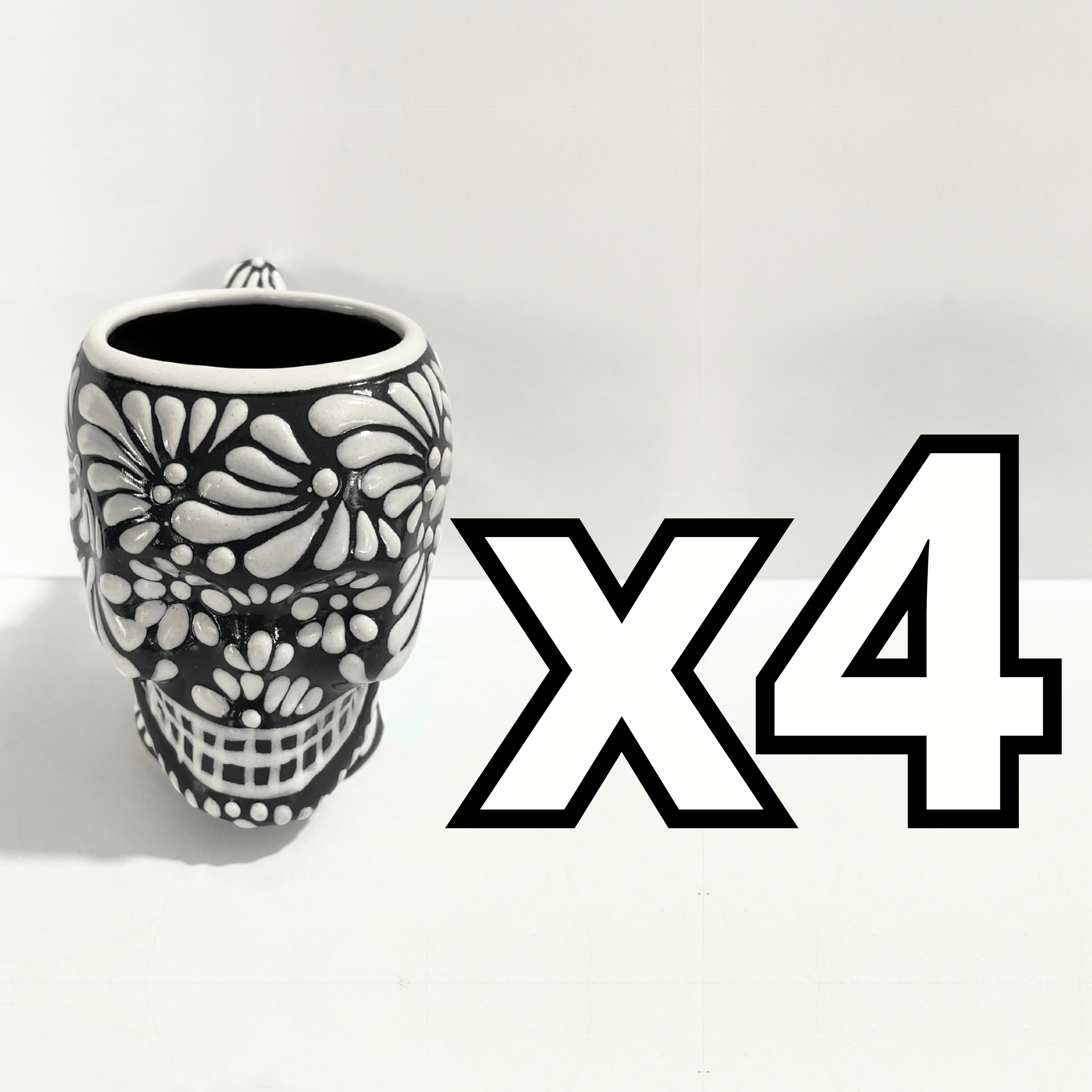 TAZA FORMA DE CRANEO FONDO NEGRO MIK BLANCO