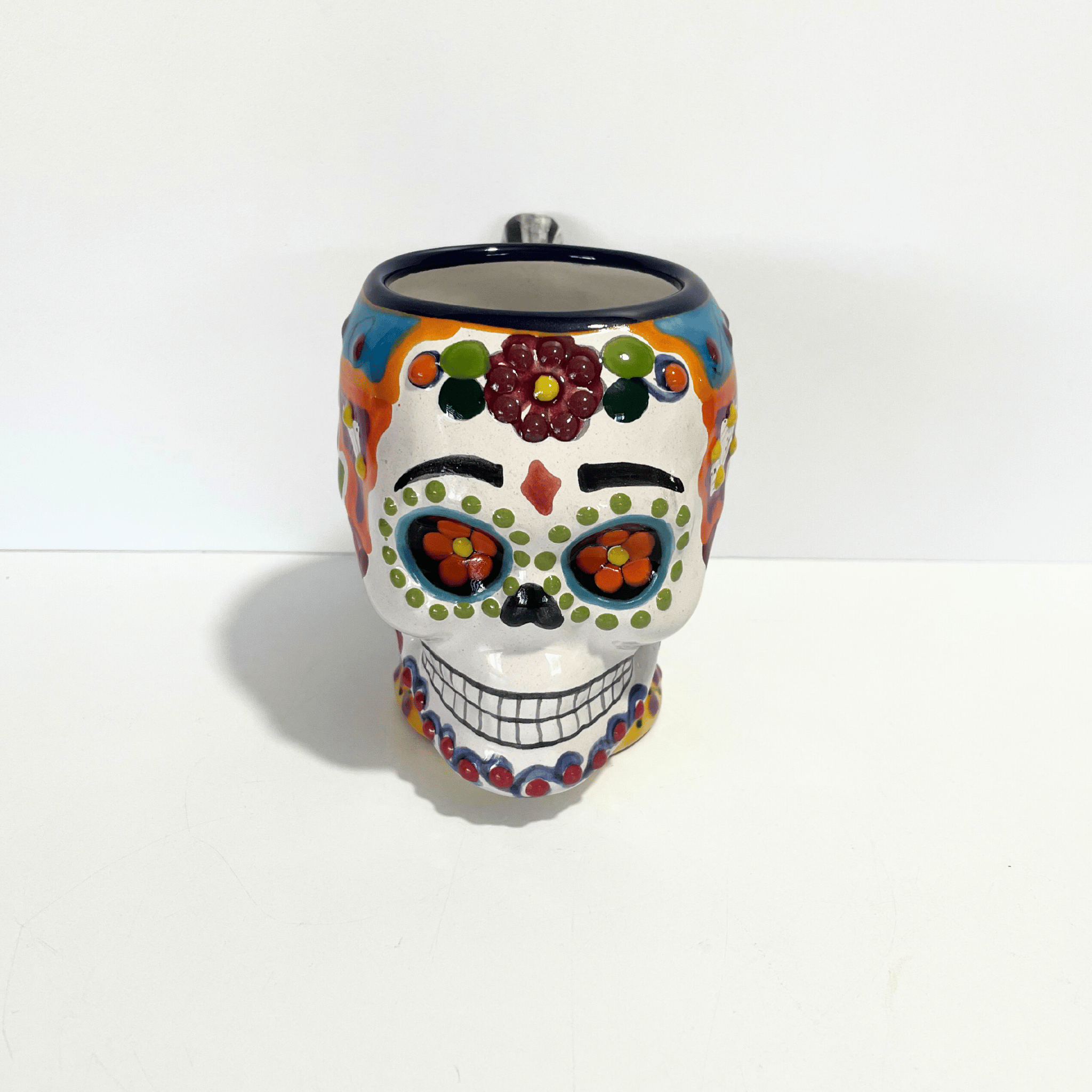 TAZA FORMA DE CRANEO FONDO TRADICIONAL FLORES MULTICOLOR