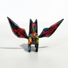 ALEBRIJE DE MADERA PERRO NEGRO FLORES MULTICOLOR
