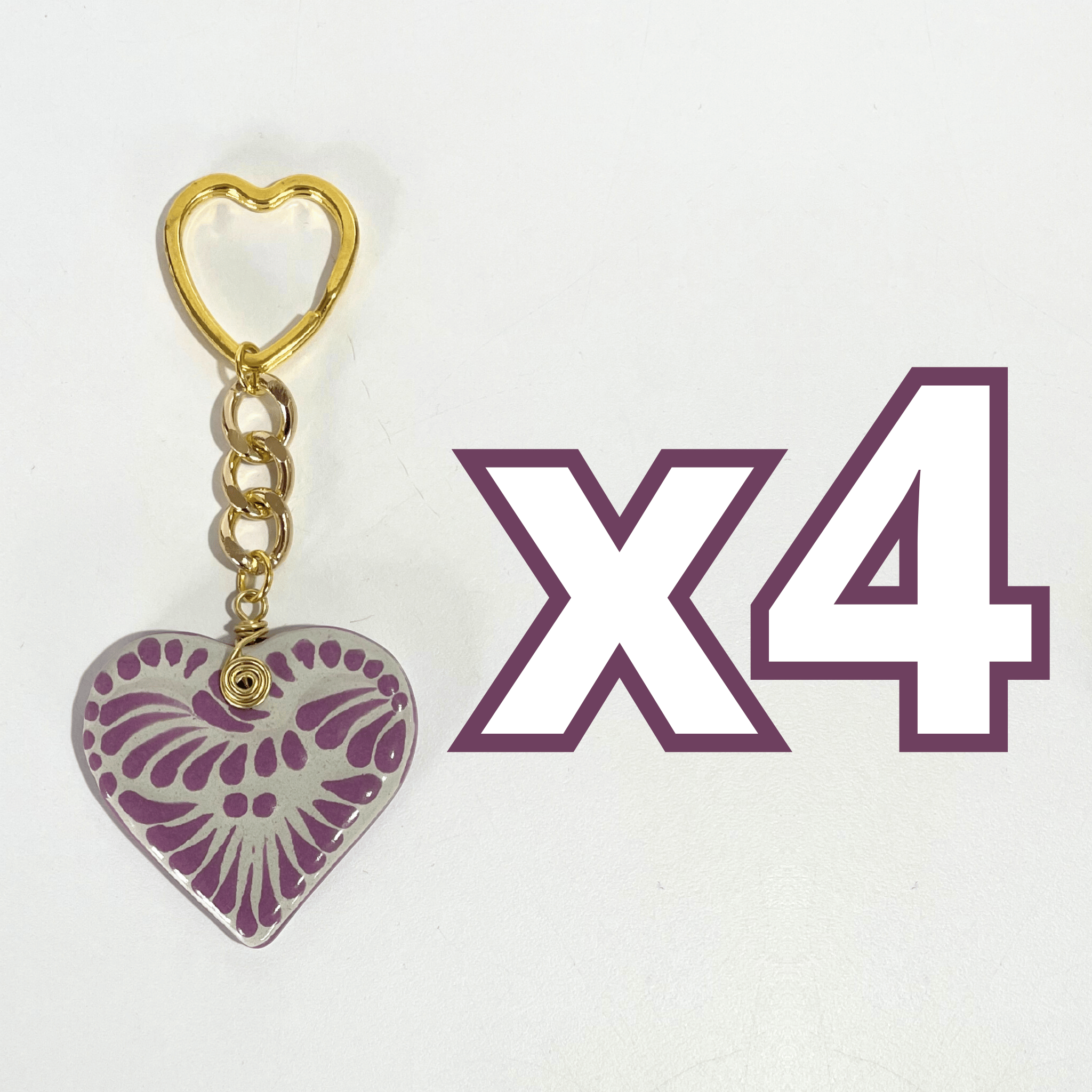 LLAVERO CORAZON PLANO CERRADO FONDO TRADICIONAL DECORADO MORADO