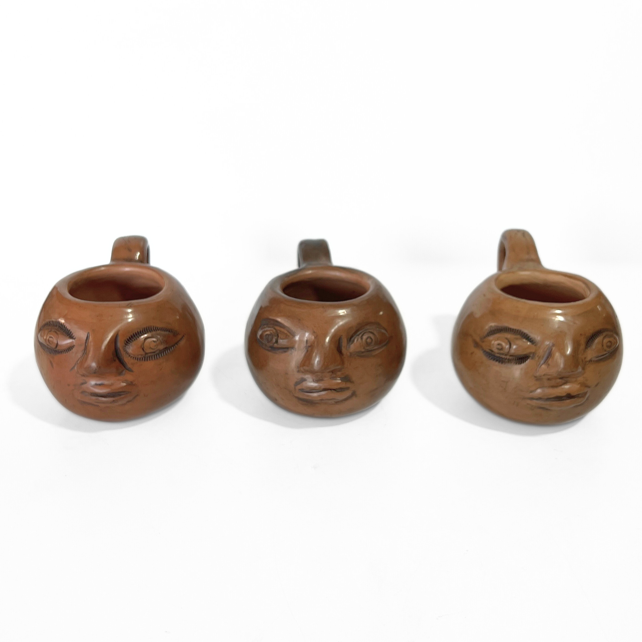 PAQUETE MINI TAZA BARRO BRUÑIDO CARITA OJOS ABIERTOS