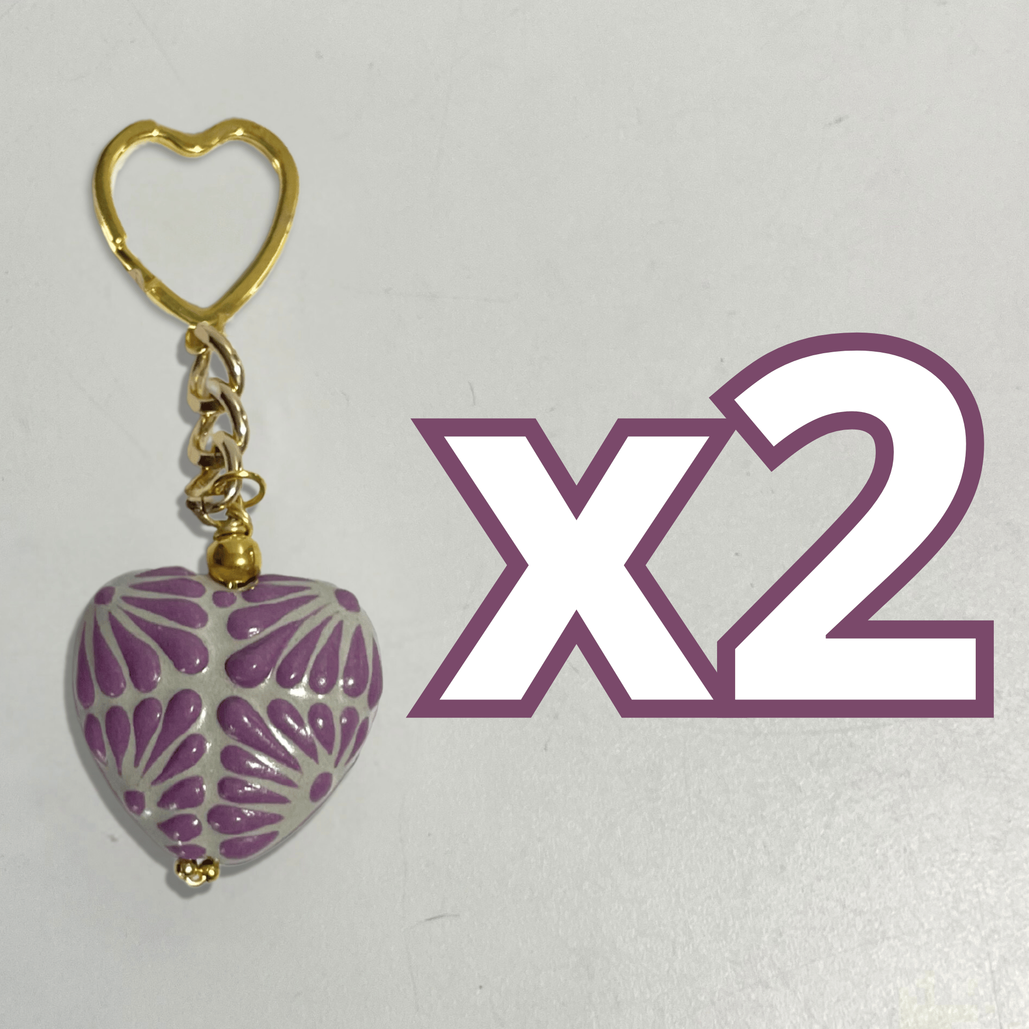 LLAVERO CORAZON INFLADO FONDO TRADICIONAL DECORADO MORADO
