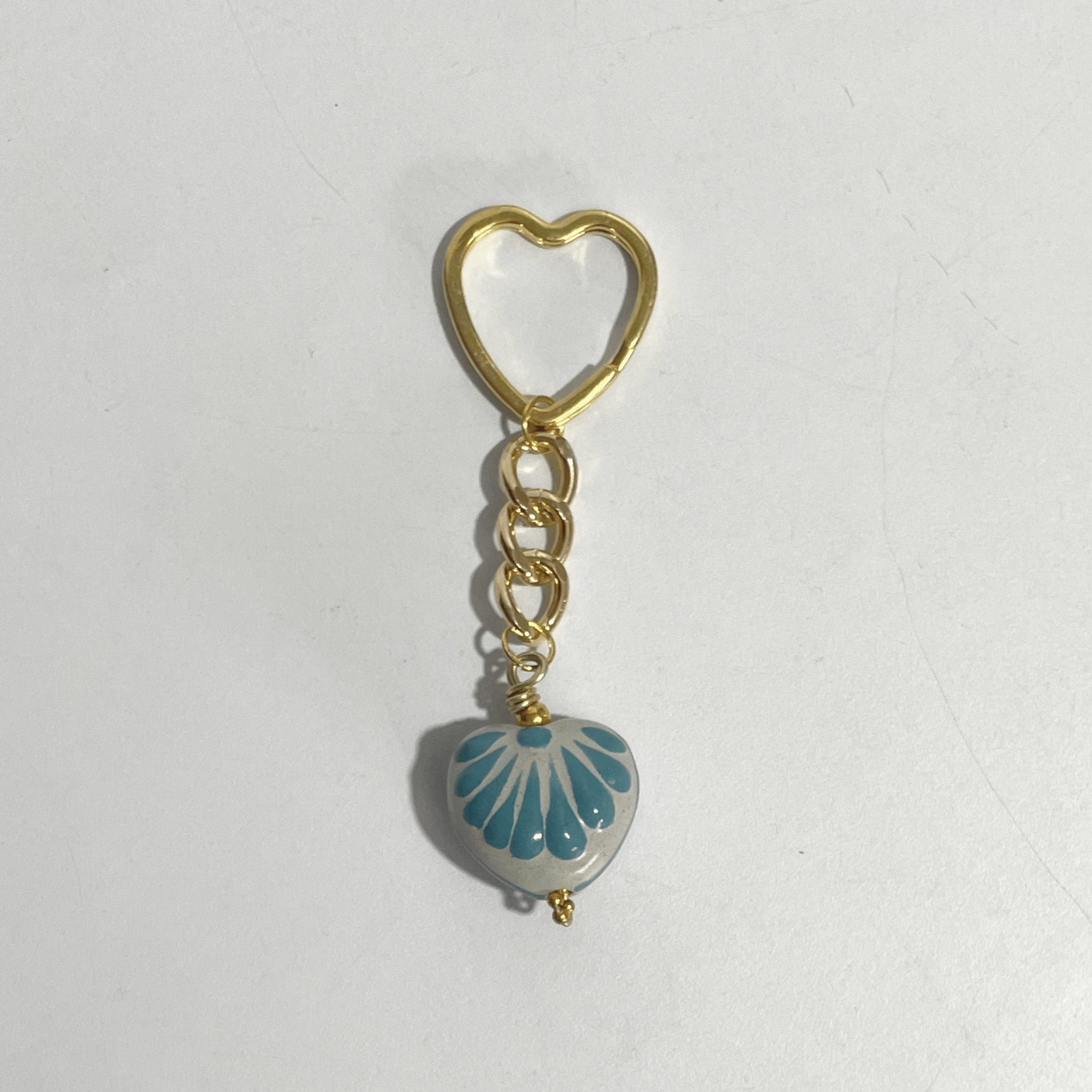 LLAVERO CORAZON CHICO 2.5 CM TRIDIMENSIONAL FONDO TRADICIONAL DECORADO AZUL TURQUESA