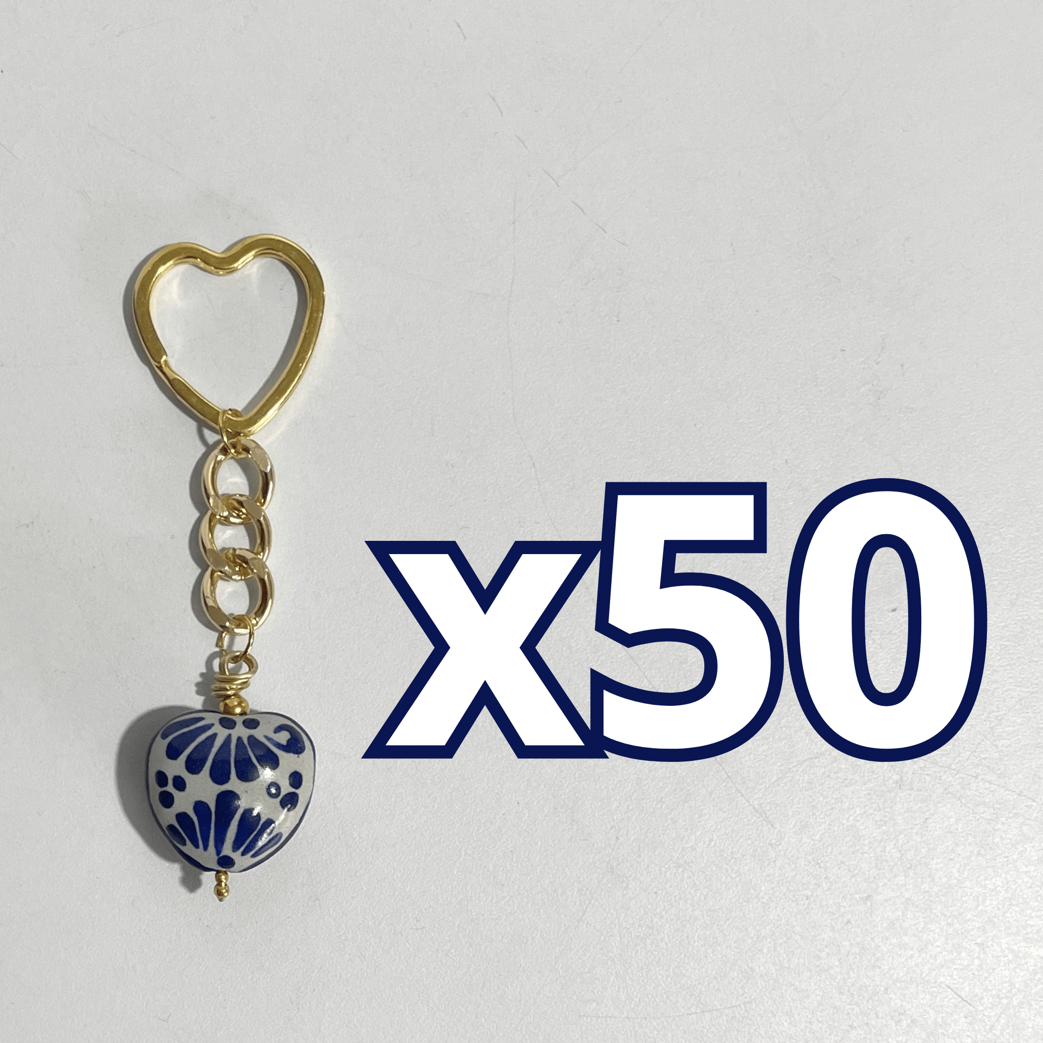LLAVERO CORAZON CHICO 2.5 CM TRIDIMENSIONAL FONDO TRADICIONAL DECORADO AZUL COBALTO