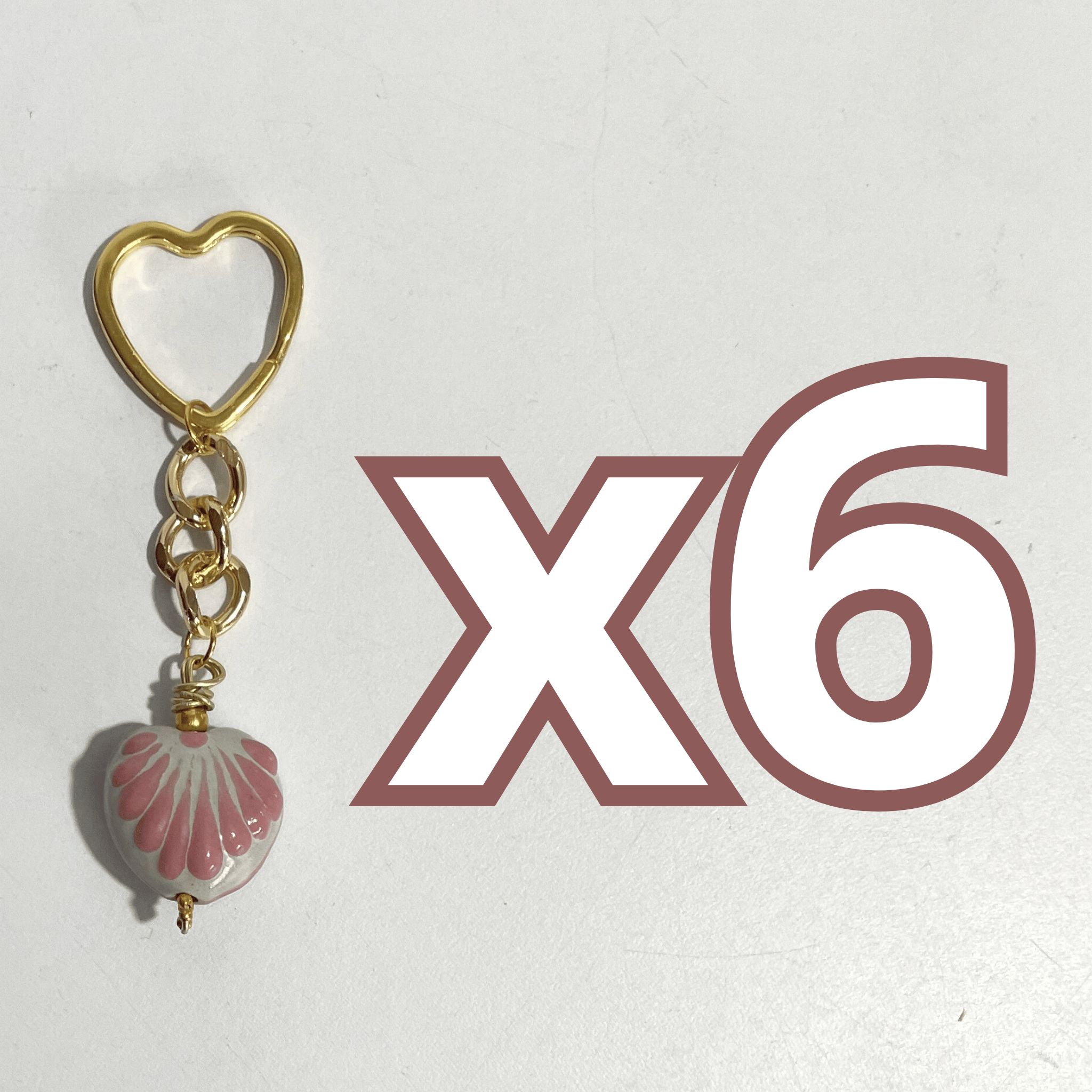 LLAVERO CORAZON CHICO 2.5 CM TRIDIMENSIONAL FONDO TRADICIONAL DECORADO ROSA