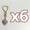 LLAVERO CORAZON CHICO 2.5 CM TRIDIMENSIONAL FONDO TRADICIONAL DECORADO ROSA