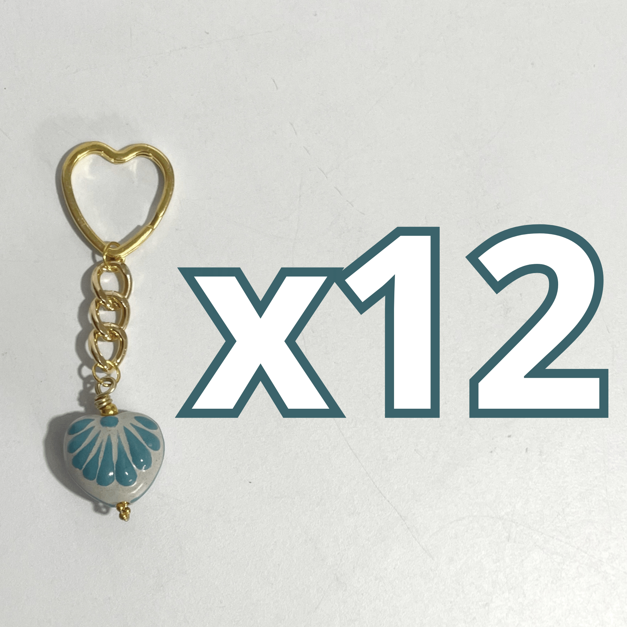 LLAVERO CORAZON CHICO 2.5 CM TRIDIMENSIONAL FONDO TRADICIONAL DECORADO AZUL TURQUESA