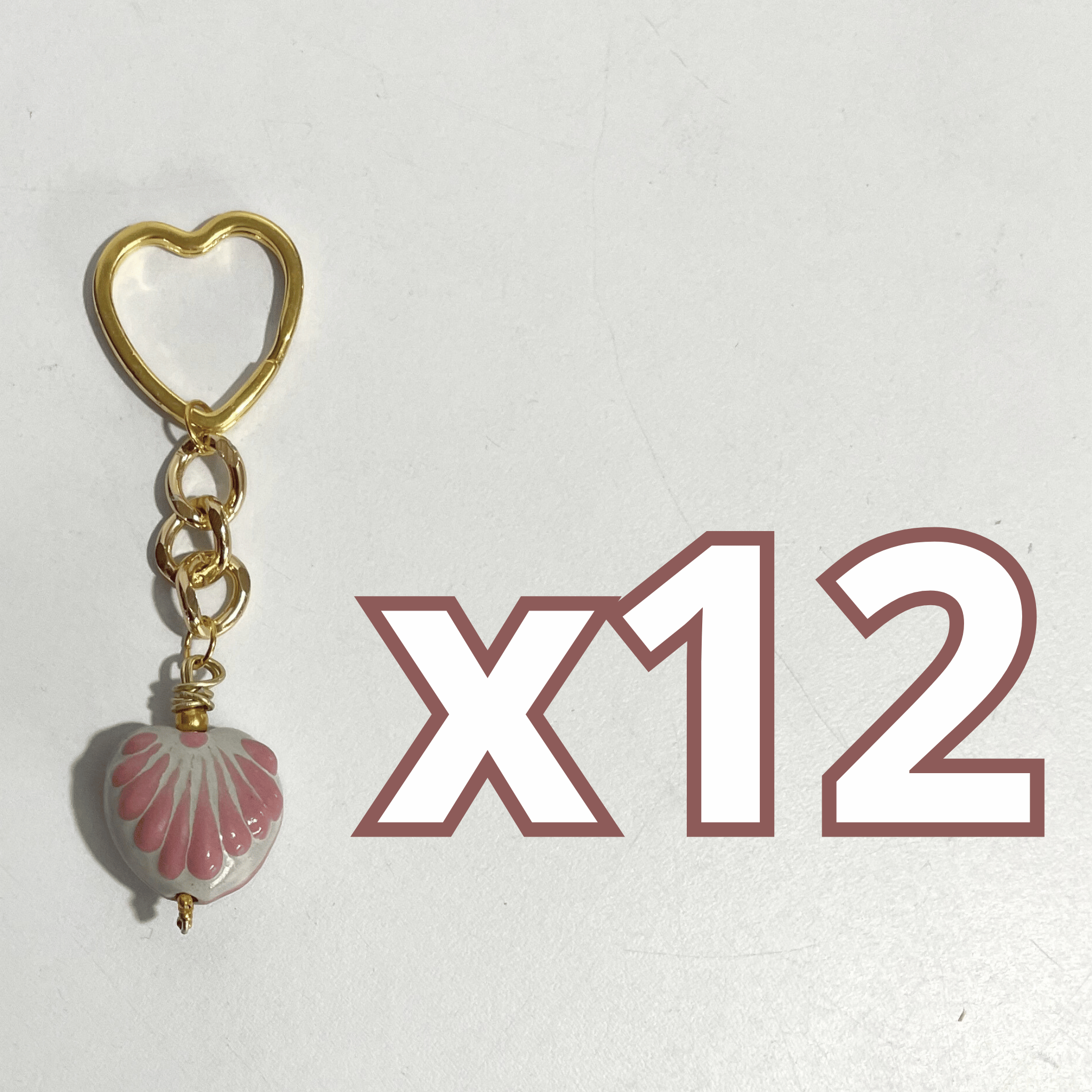 LLAVERO CORAZON CHICO 2.5 CM TRIDIMENSIONAL FONDO TRADICIONAL DECORADO ROSA