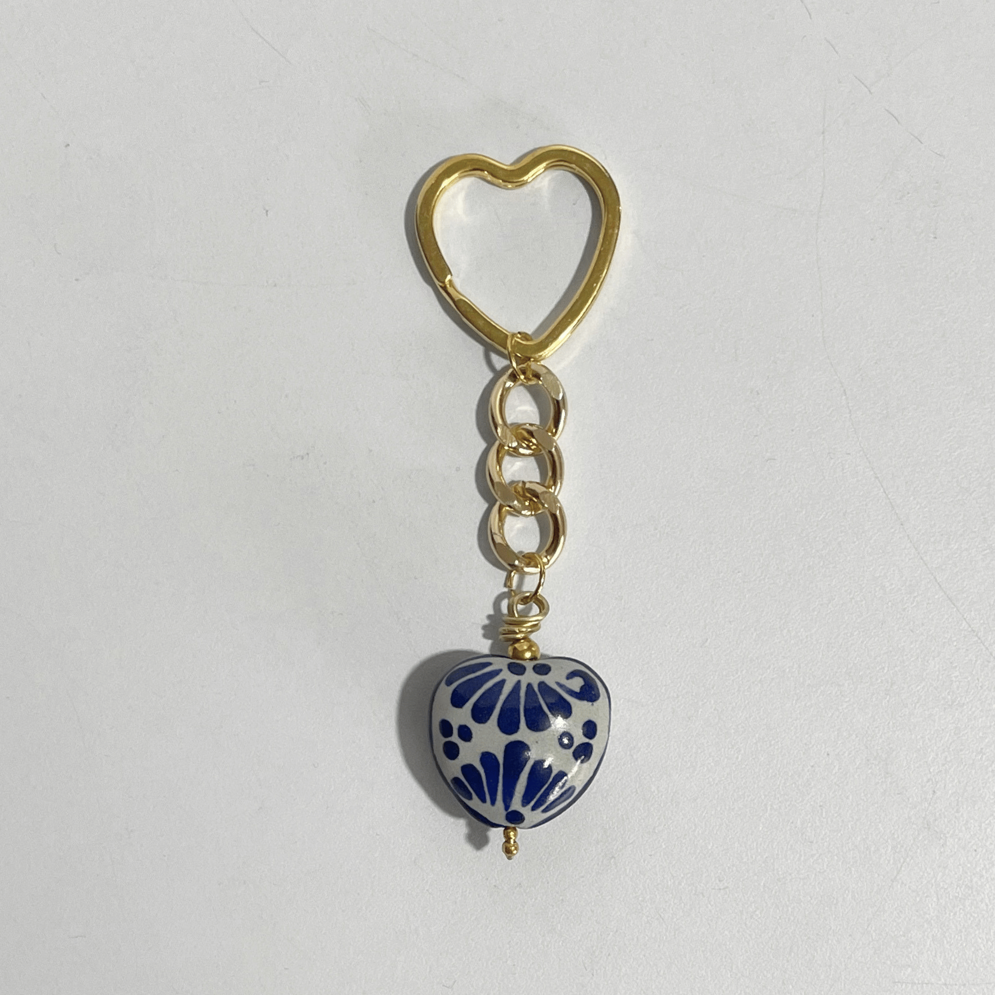 LLAVERO CORAZON CHICO 2.5 CM TRIDIMENSIONAL FONDO TRADICIONAL DECORADO AZUL COBALTO