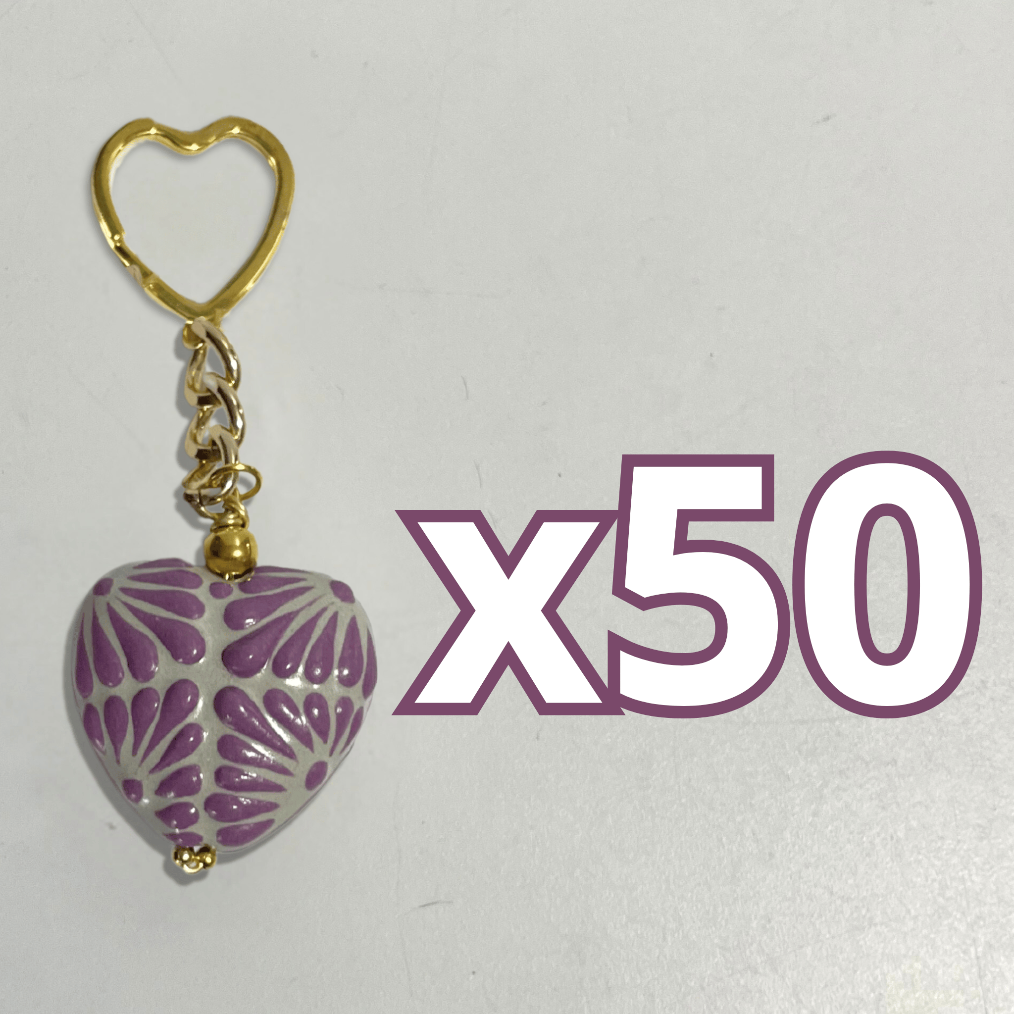 LLAVERO CORAZON INFLADO FONDO TRADICIONAL DECORADO MORADO