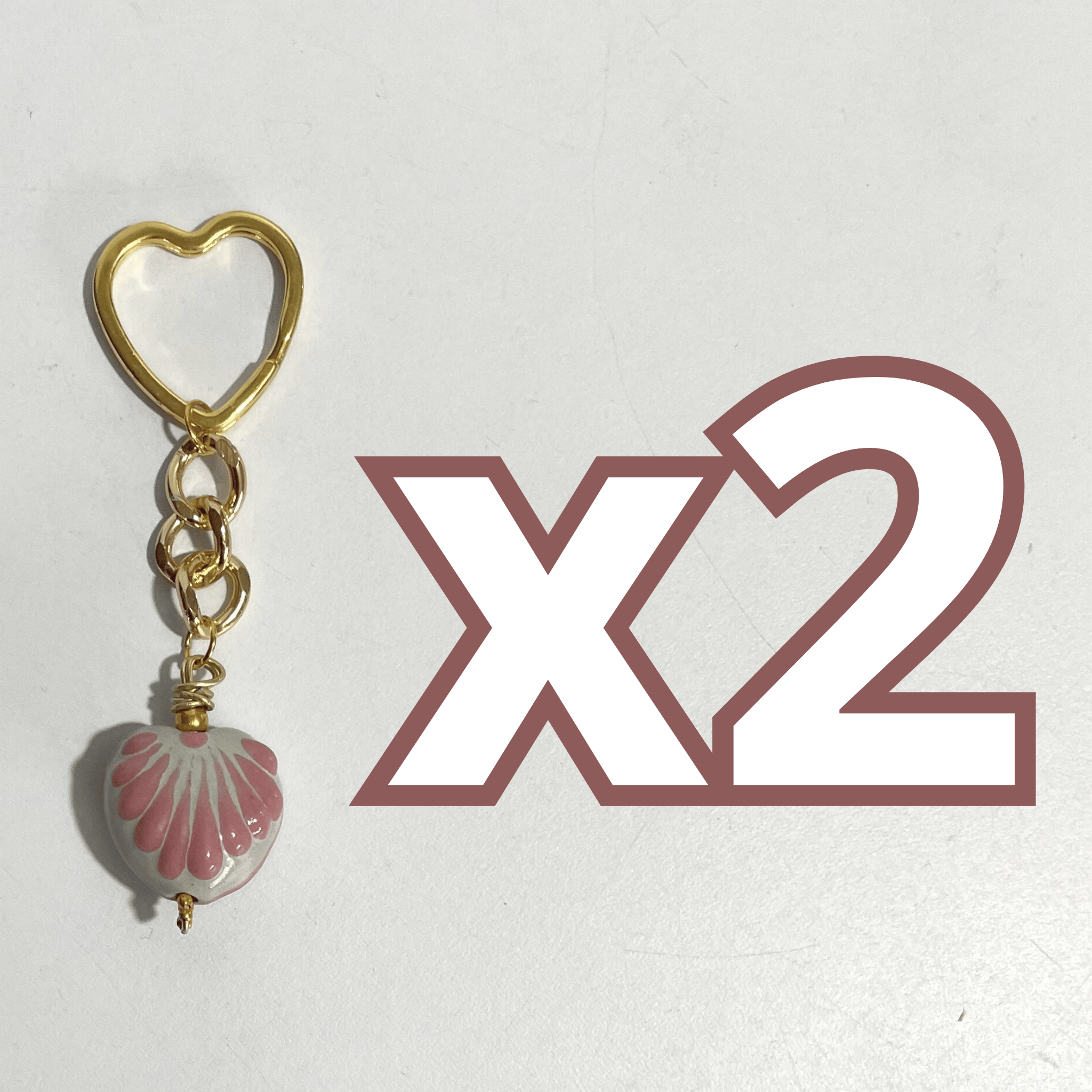 LLAVERO CORAZON CHICO 2.5 CM TRIDIMENSIONAL FONDO TRADICIONAL DECORADO ROSA