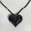 COLLAR DIJE DE CORAZON BARRO NEGRO