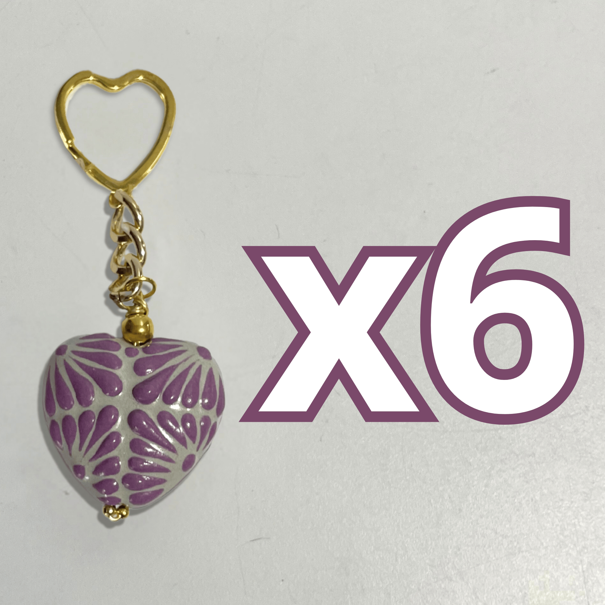LLAVERO CORAZON INFLADO FONDO TRADICIONAL DECORADO MORADO
