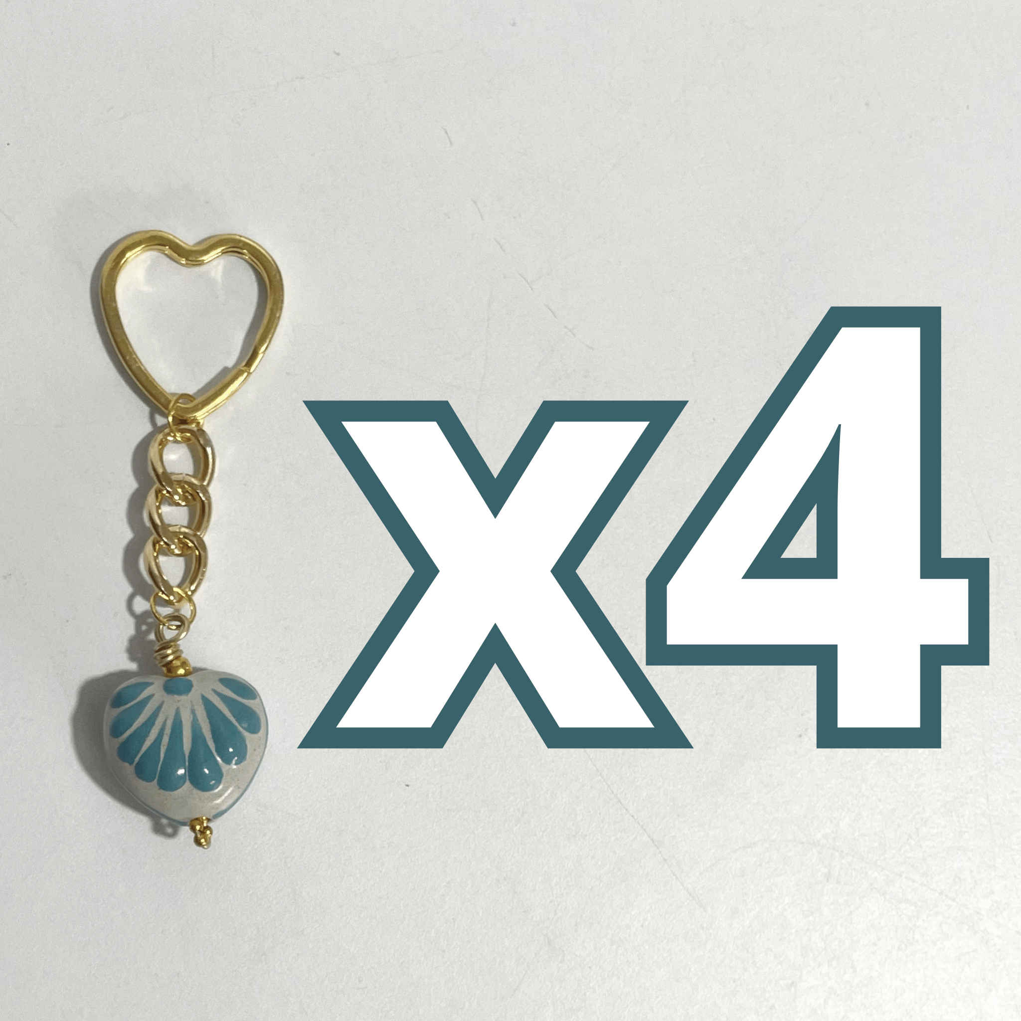 LLAVERO CORAZON CHICO 2.5 CM TRIDIMENSIONAL FONDO TRADICIONAL DECORADO AZUL TURQUESA