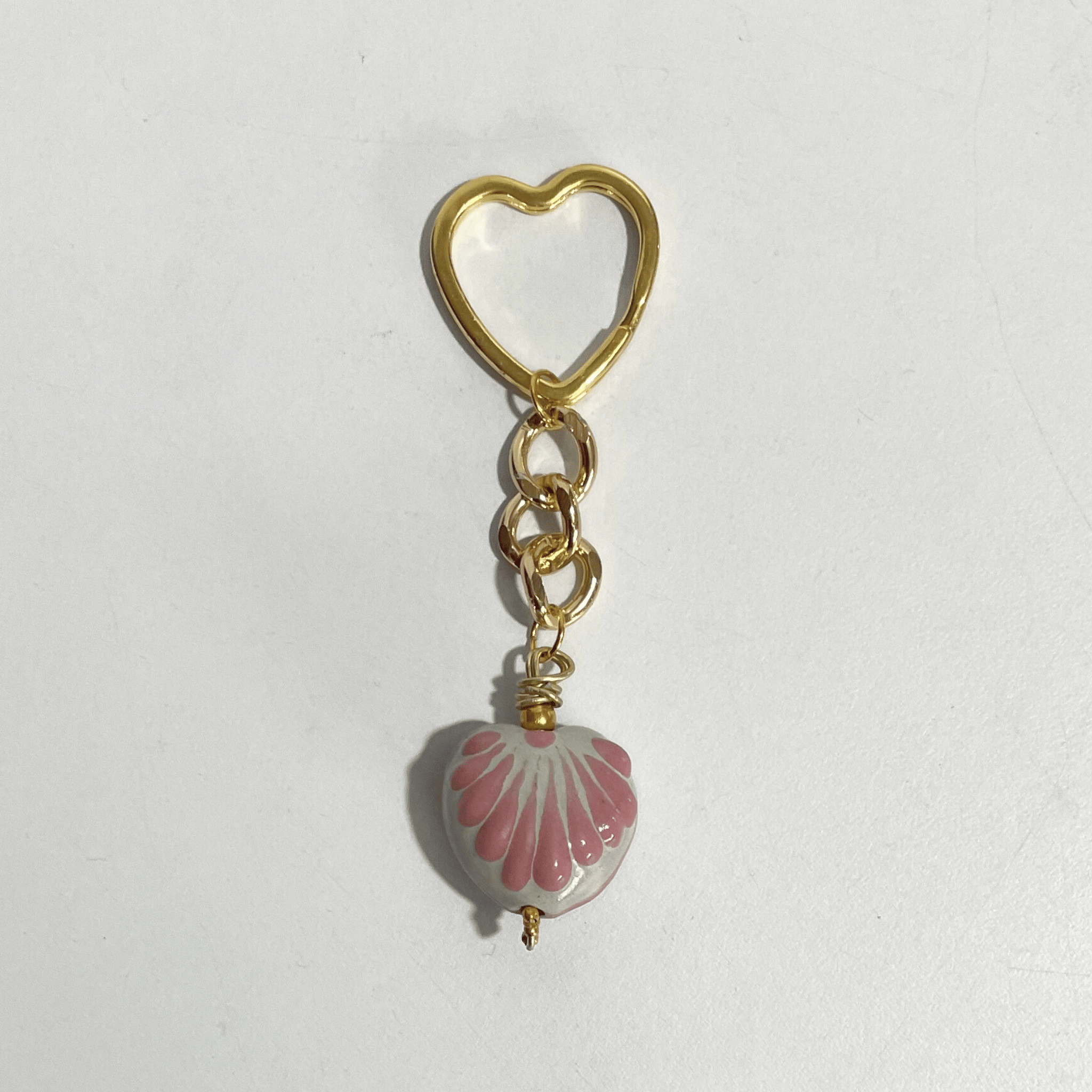 LLAVERO CORAZON CHICO 2.5 CM TRIDIMENSIONAL FONDO TRADICIONAL DECORADO ROSA