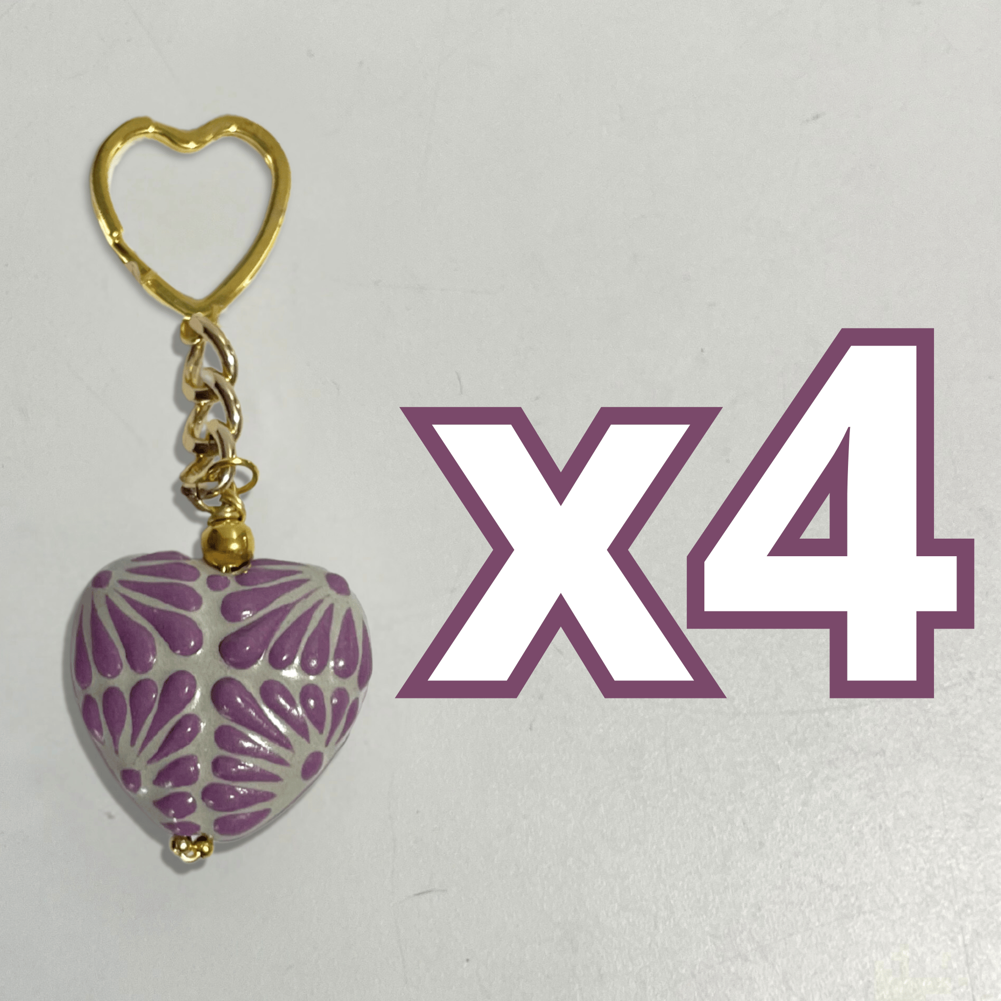 LLAVERO CORAZON INFLADO FONDO TRADICIONAL DECORADO MORADO