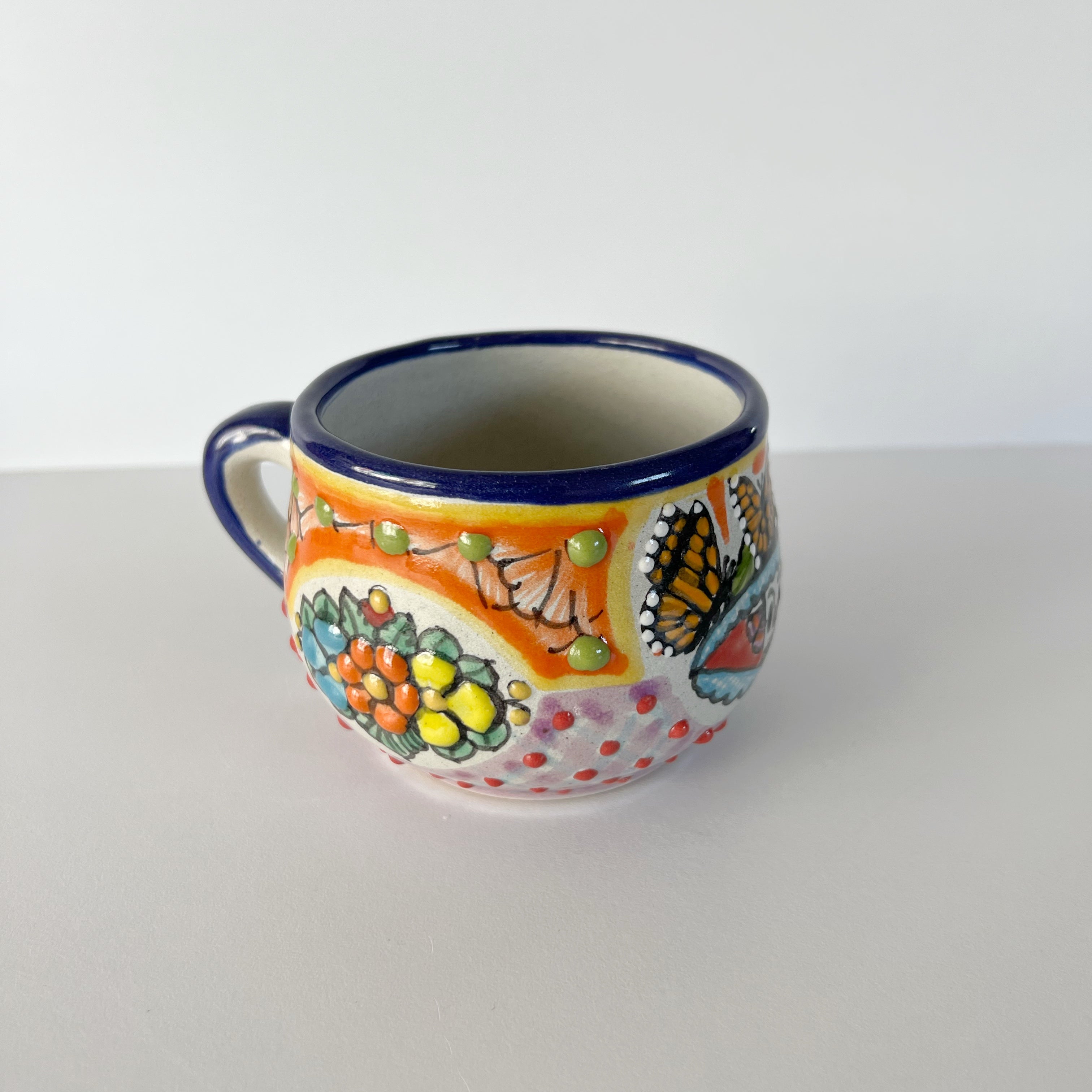 TAZA CHOCOLATERA MEDIANA MULTICOLORES CATRINA MARIPOSA