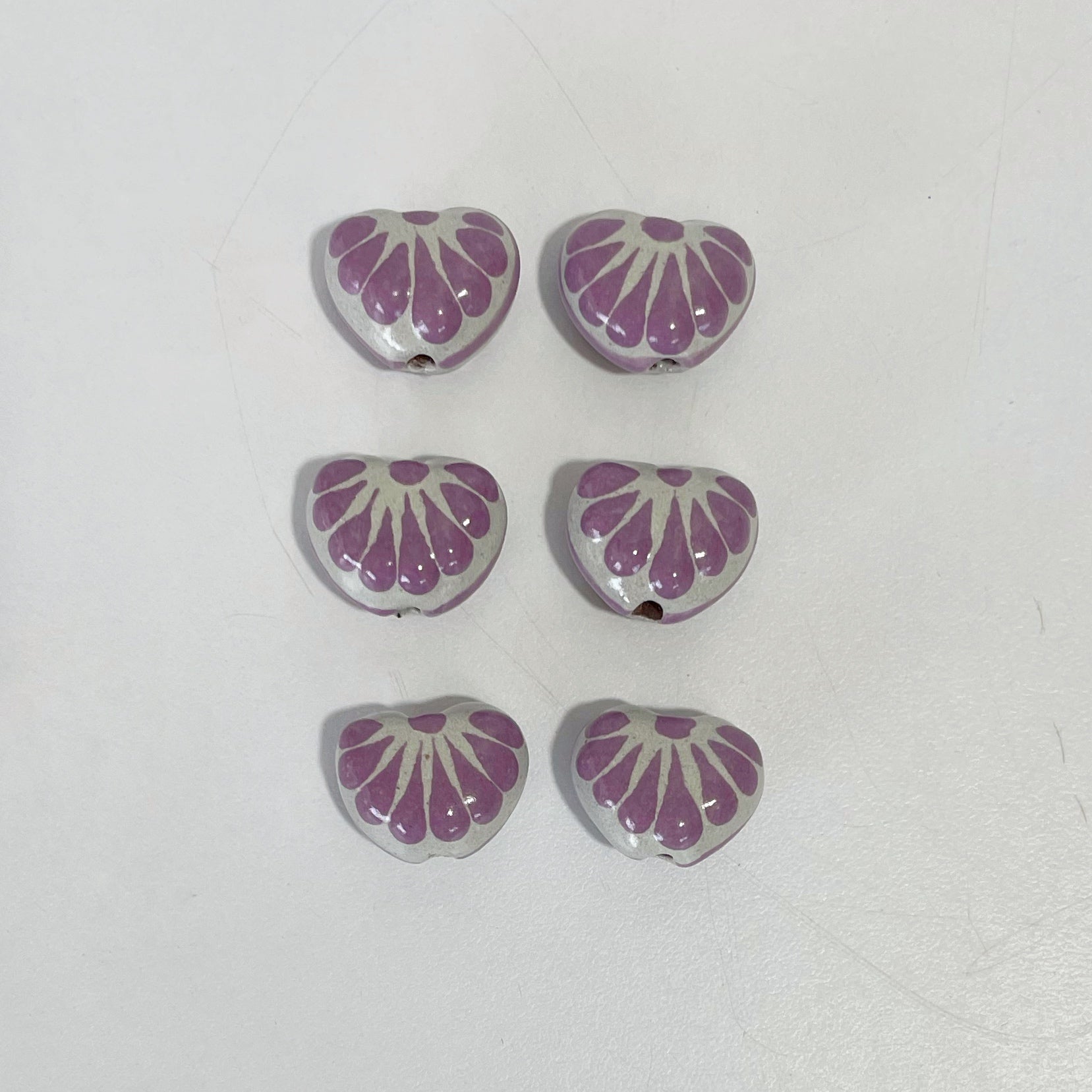 CORAZON TRIDIMENSIONAL INFLADO 1.5 CM FONDO TRADICIONAL DECORADO MORADO