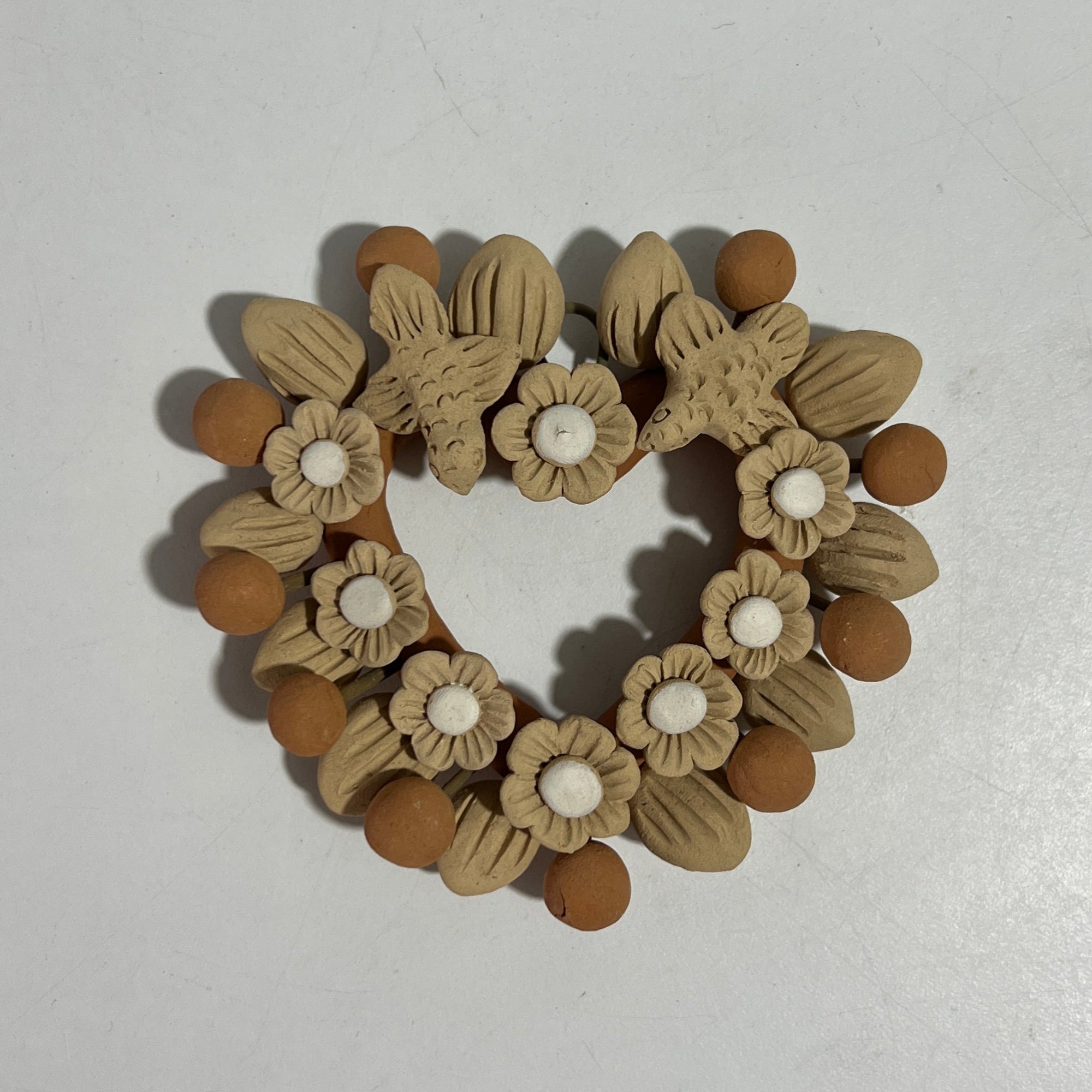 CORAZON BARRO FLORES Y AVES