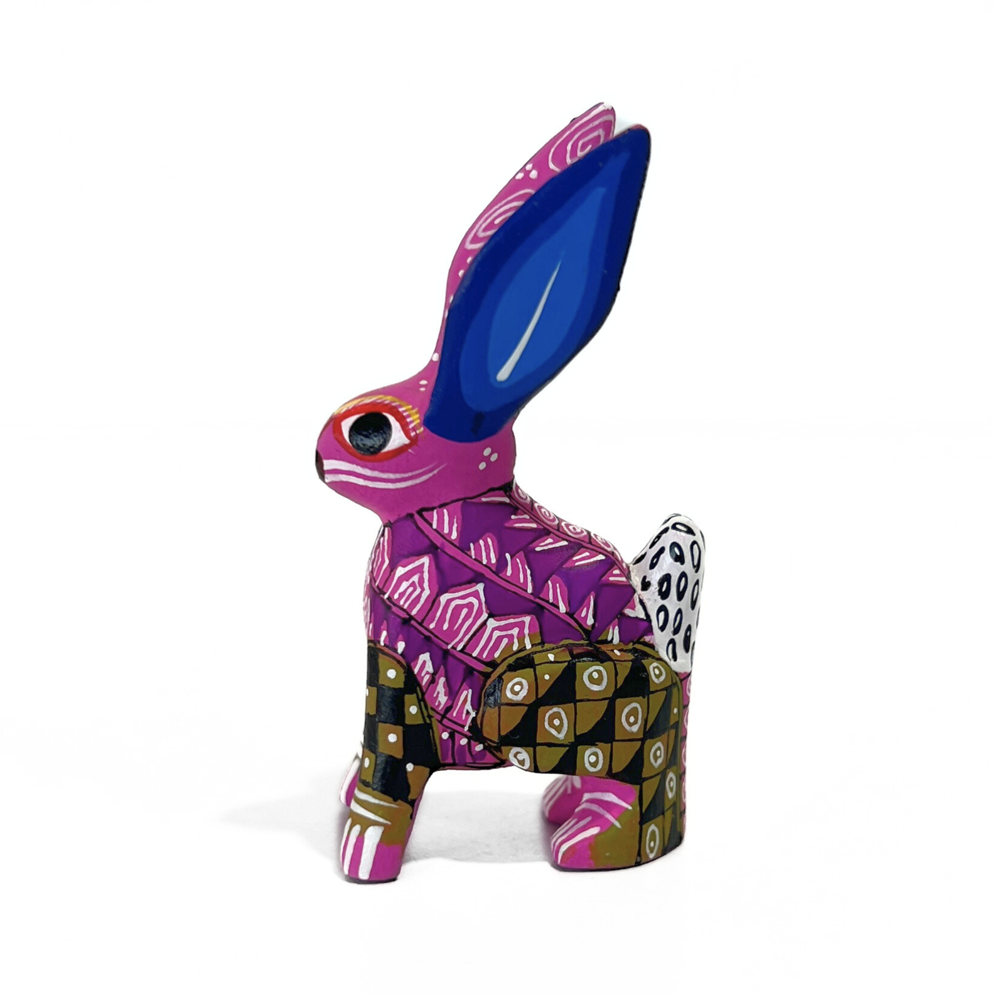 ALEBRIJE DE MADERA CONEJO ROSA CON. MORADO OREJAS AZULES