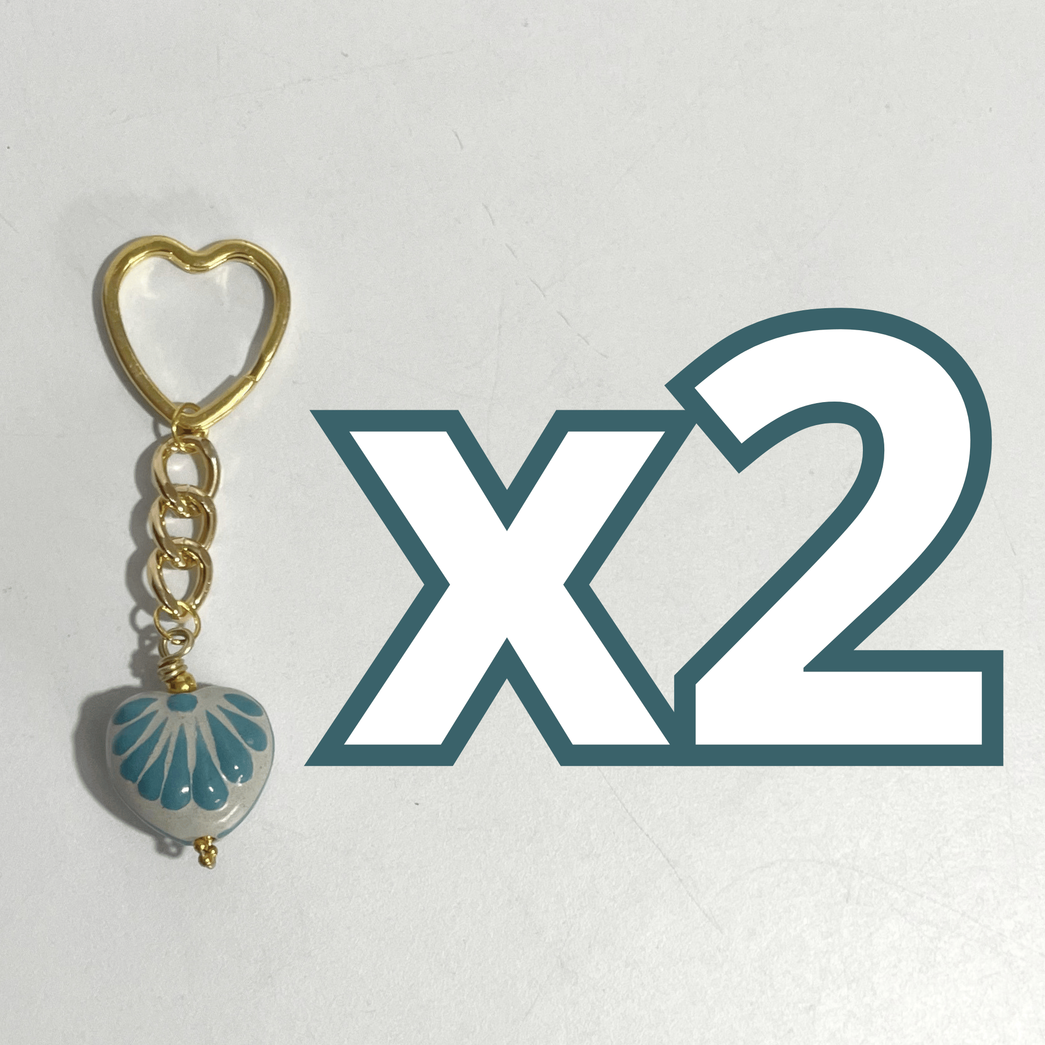 LLAVERO CORAZON CHICO 2.5 CM TRIDIMENSIONAL FONDO TRADICIONAL DECORADO AZUL TURQUESA