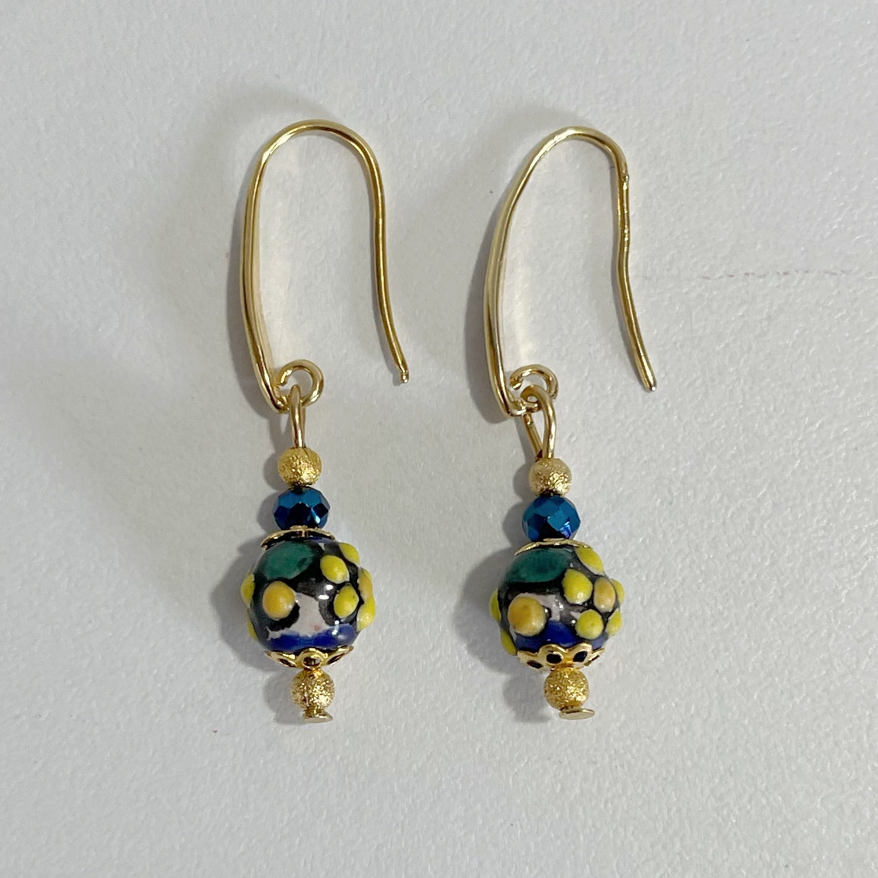 ARETES MULTICOLOR FLORES