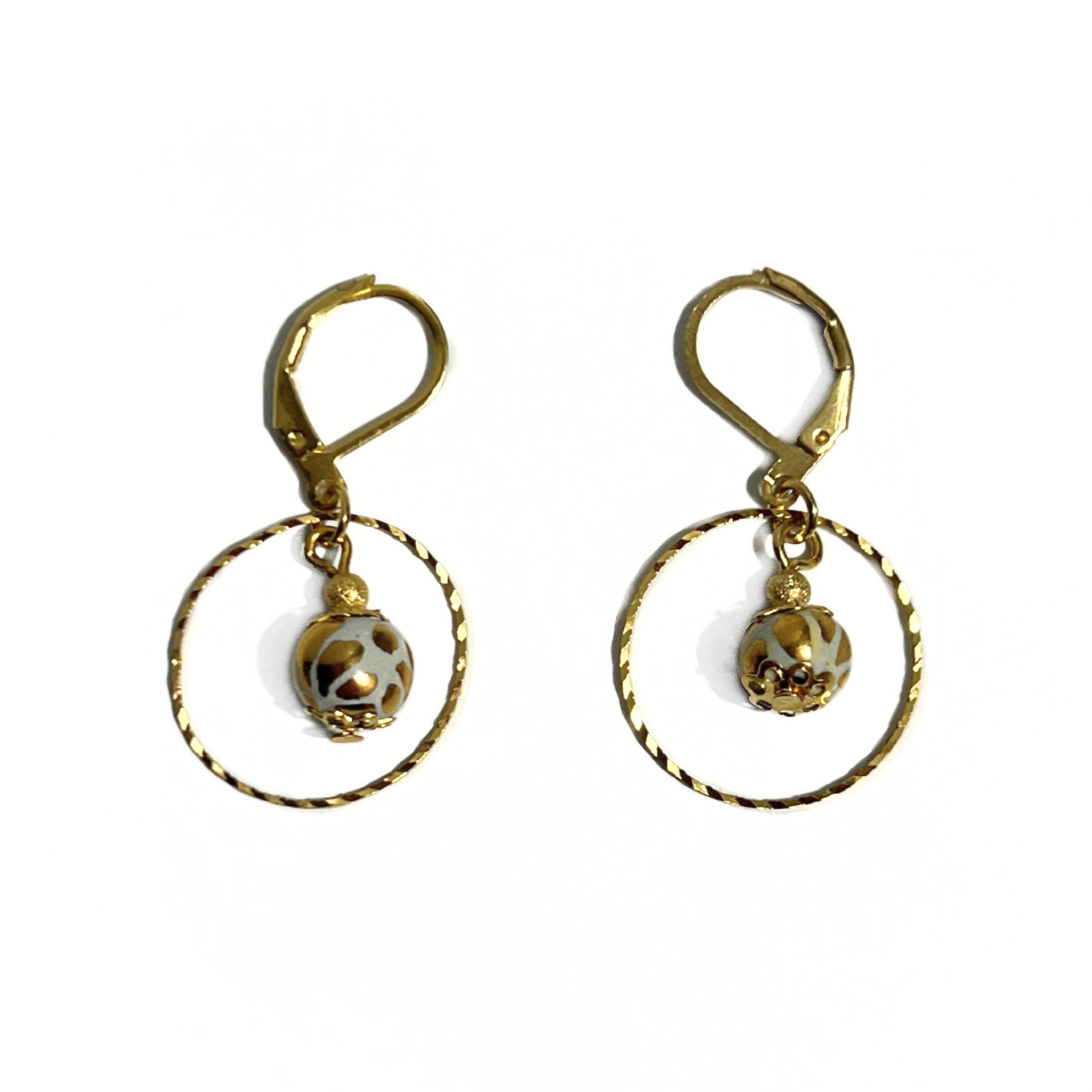 ARETES ARO ESFERA FONDO TRADICIONAL DESTELLOS DE ORO
